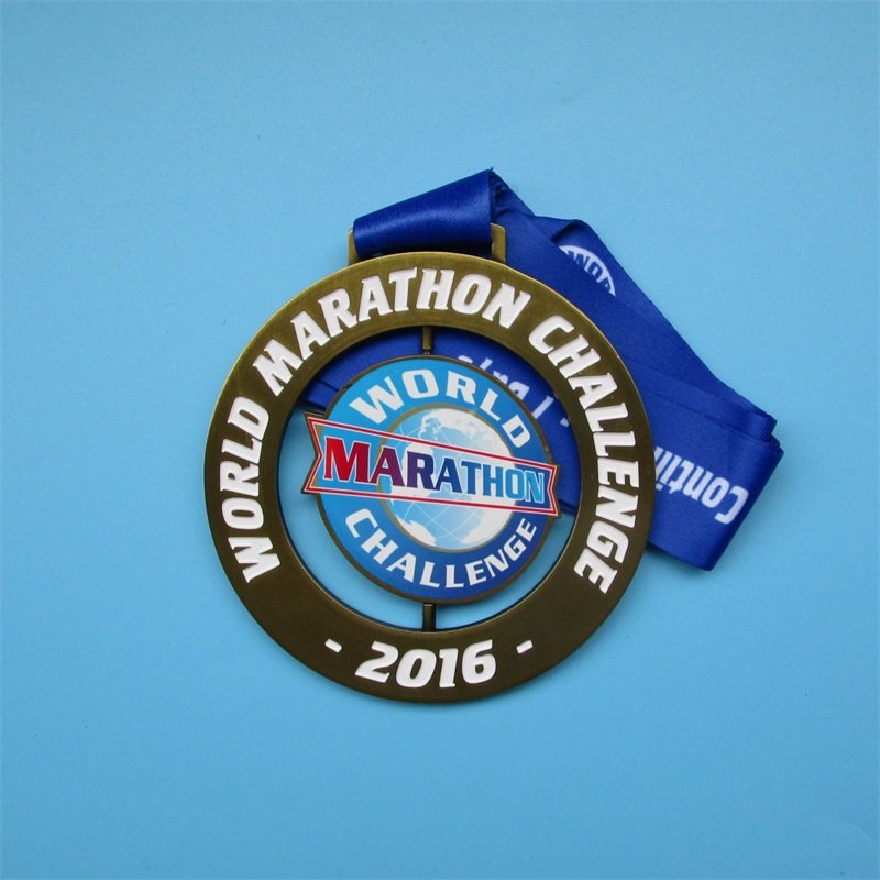 Пользовательский дизайн World Marathon Challenge Spin Medal